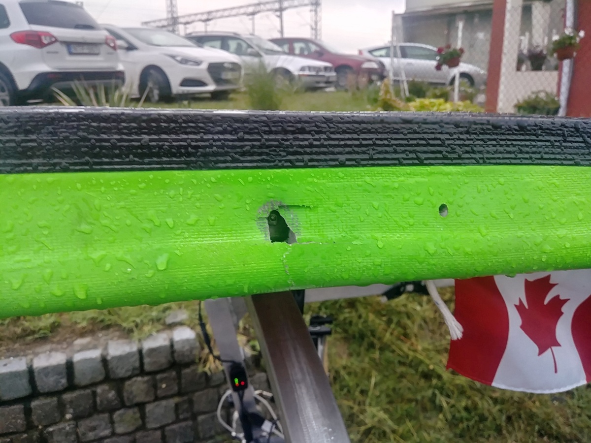 We only installed one bolt on the front support of the solar panel and this proved a big mistake, as the bolt got loose and eventually punctured and broke trough the fiberglass and foam.